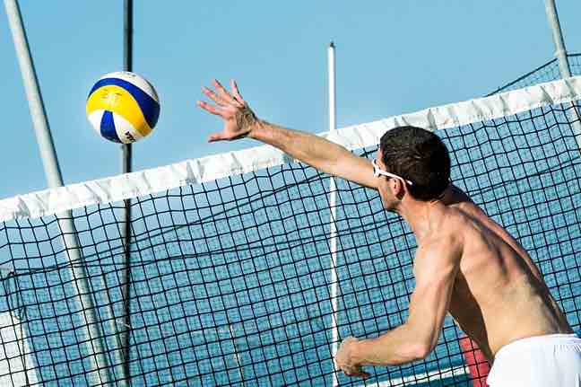 Easy sports: juggling soccer balls.